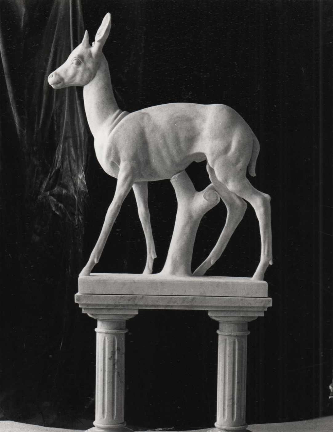 Hand-carved marble deer sculpture on fluted column pedestal, Studio Giannoni